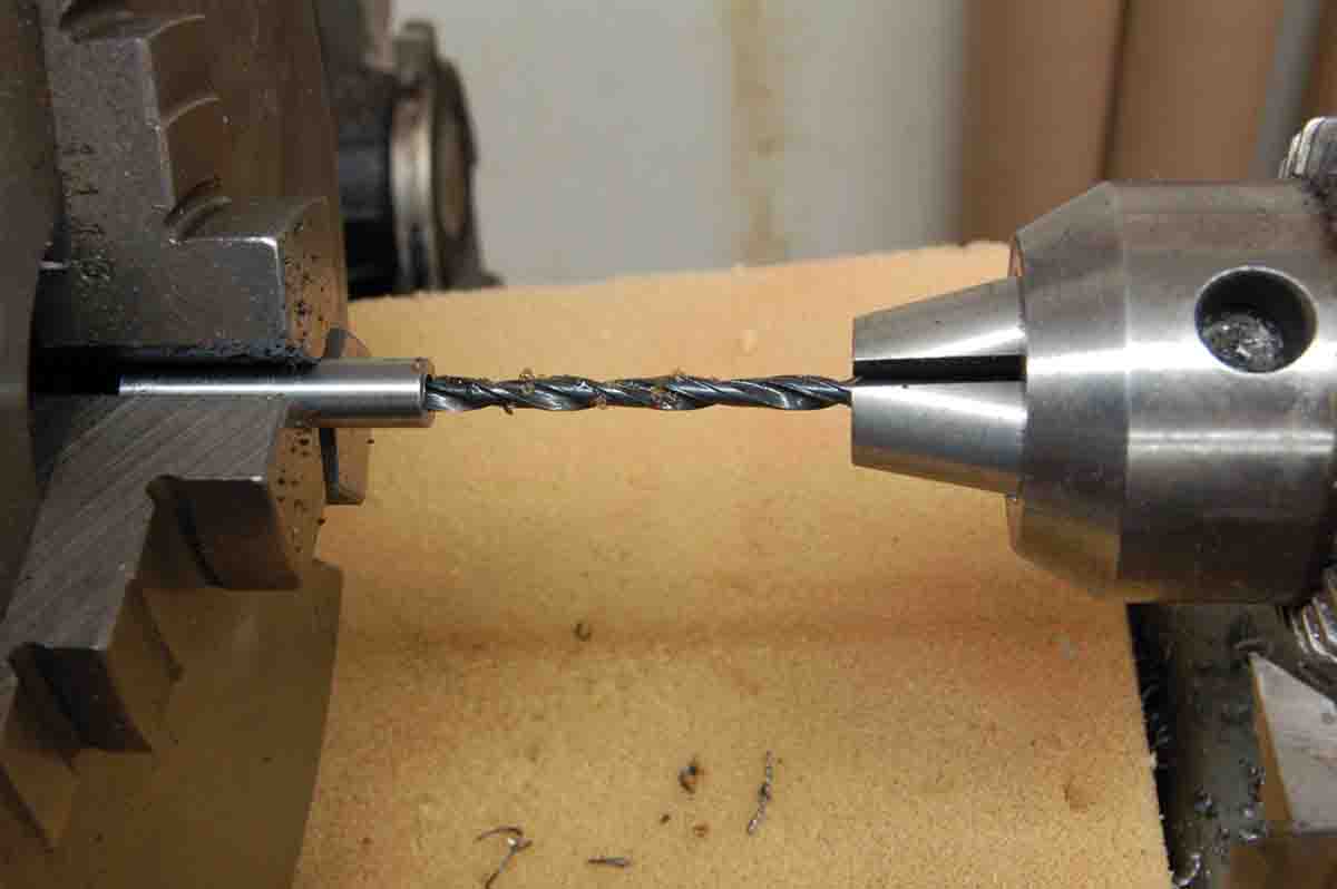 A 1⁄8-inch hole is drilled through the guide made from a short section of .250-inch drill rod.